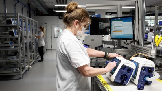 Employees of Hamilton Medical AG test ventilators at a plant