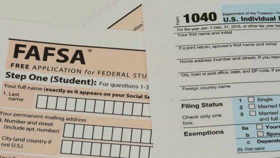 FAFSA form next to a 1040 form