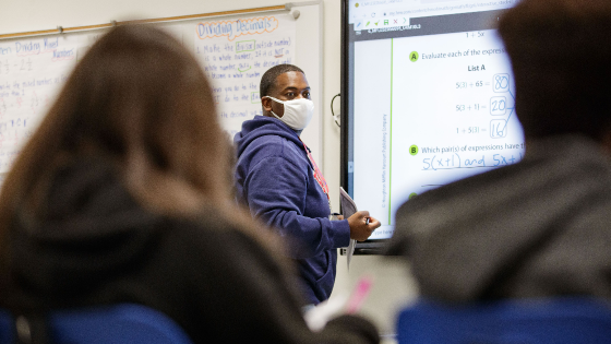 Fairview Middle School sixth grade math teacher Breshaun Chambers teaches his class a new algebra lesson