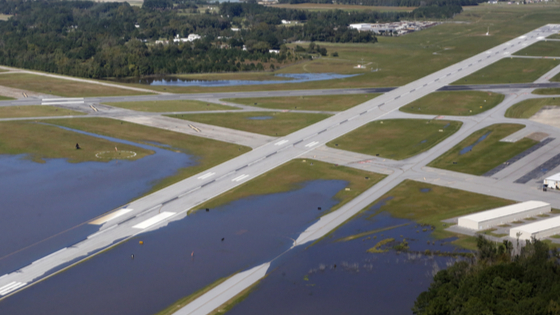 Flooding waters of Tar River begin to cover Pitt-Greenville Airport due to rainfall caused from Hurricane Matthew in Greenville, North Carolina