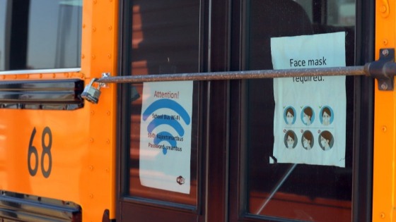 Flyers are posted on the doors of Deming Public School bus 68 near the Mexican border in Columbus