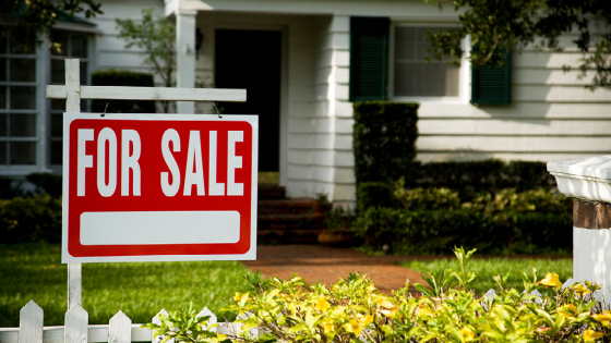 For sale sign outside of house