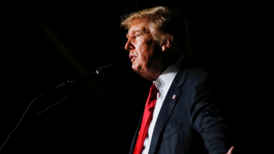 Former U.S. President Donald Trump reacts during his speech during a rally at the Iowa States Fairgrounds in Des Moines