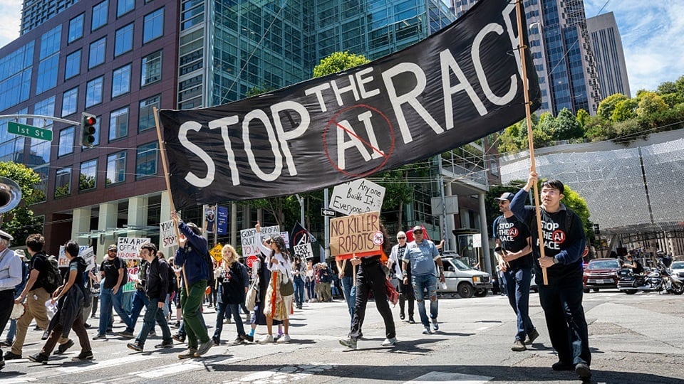 Demonstrators participate in the "Stop the AI Race" protest march in San Francisco, California