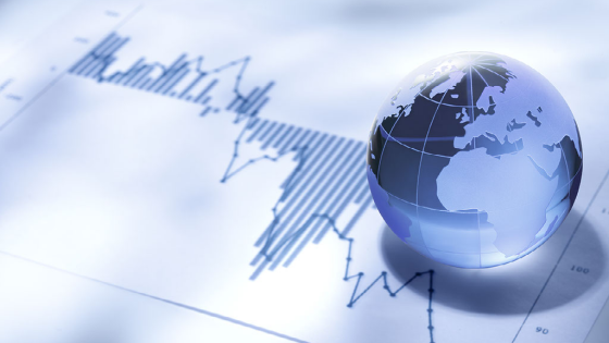 Globe over financial charts