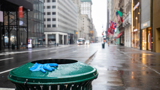 Glove on empty street of New York City during Coronavirus quarantine lockdown