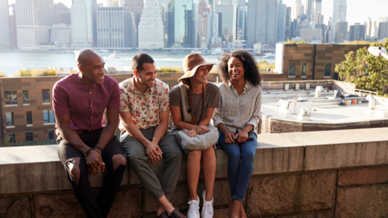 Group of friends on a balcony in New York City