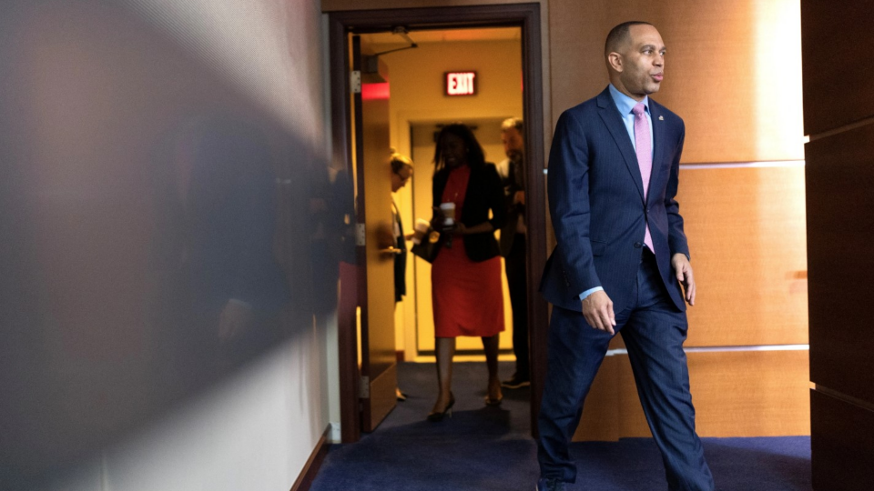 House Democratic Minority Leader Hakeem Jeffries walks to his weekly news conference on Capitol Hill