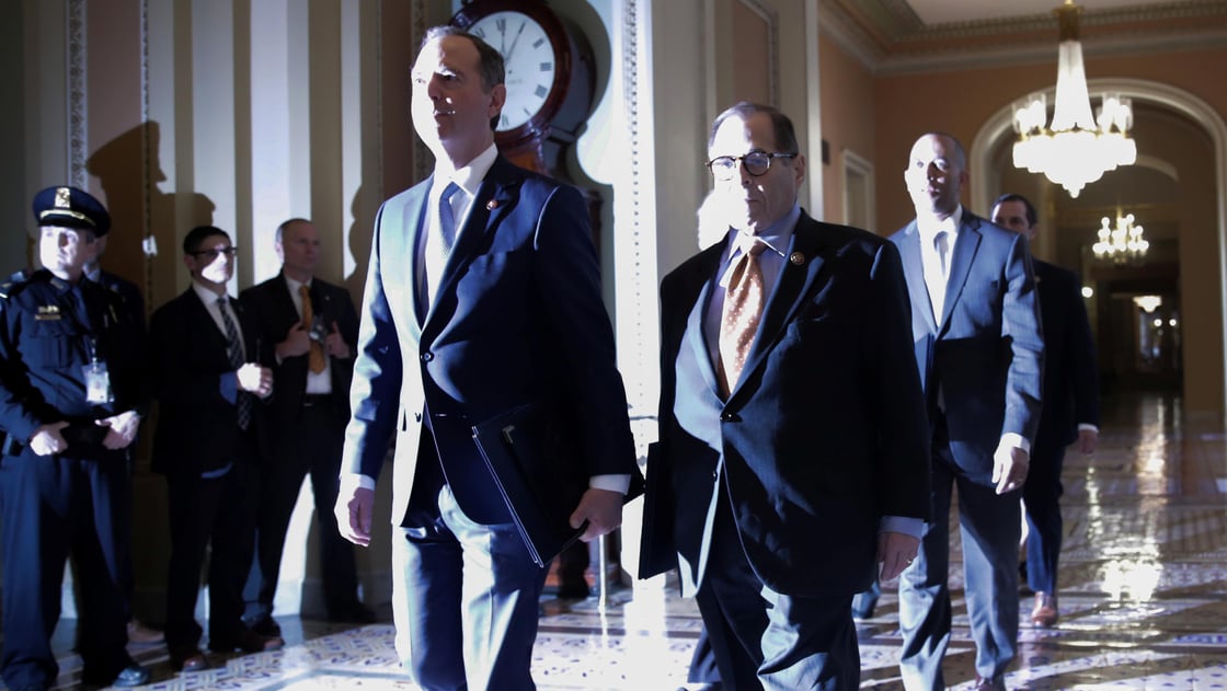 House impeachment managers walking to the Rotunda