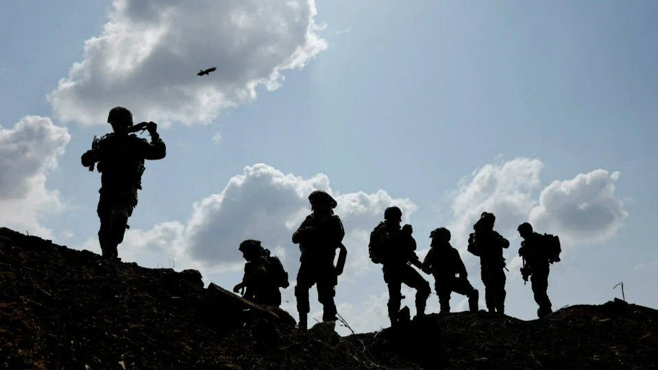 Israeli soldiers gather after the alert of an apparent security incident in Ashkelon