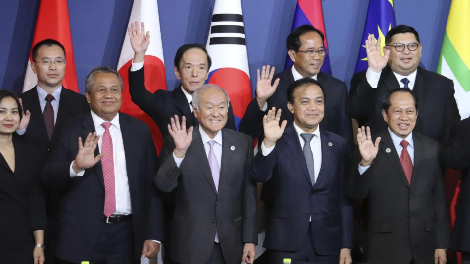 Japanese Finance Minister Shunichi Suzuki poses for a photo with finance chiefs from the Association of Southeast Asian Nations plus Japan, China and South Korea