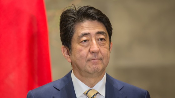 Japanese Prime Minister Shinzo Abe in front of Japenese flag