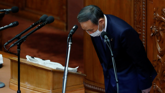 Japanese Prime Minister Yoshihide Suga gives his first policy speech in parliament in Tokyo