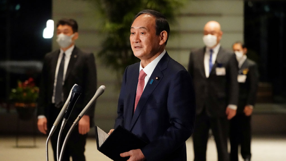 Japanese Prime Minister Yoshihide Suga speaks to media