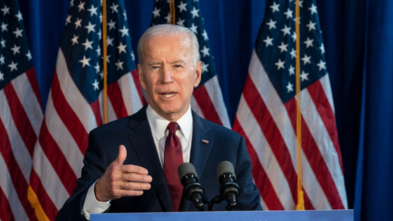 Joe Biden delivers speech at podium.