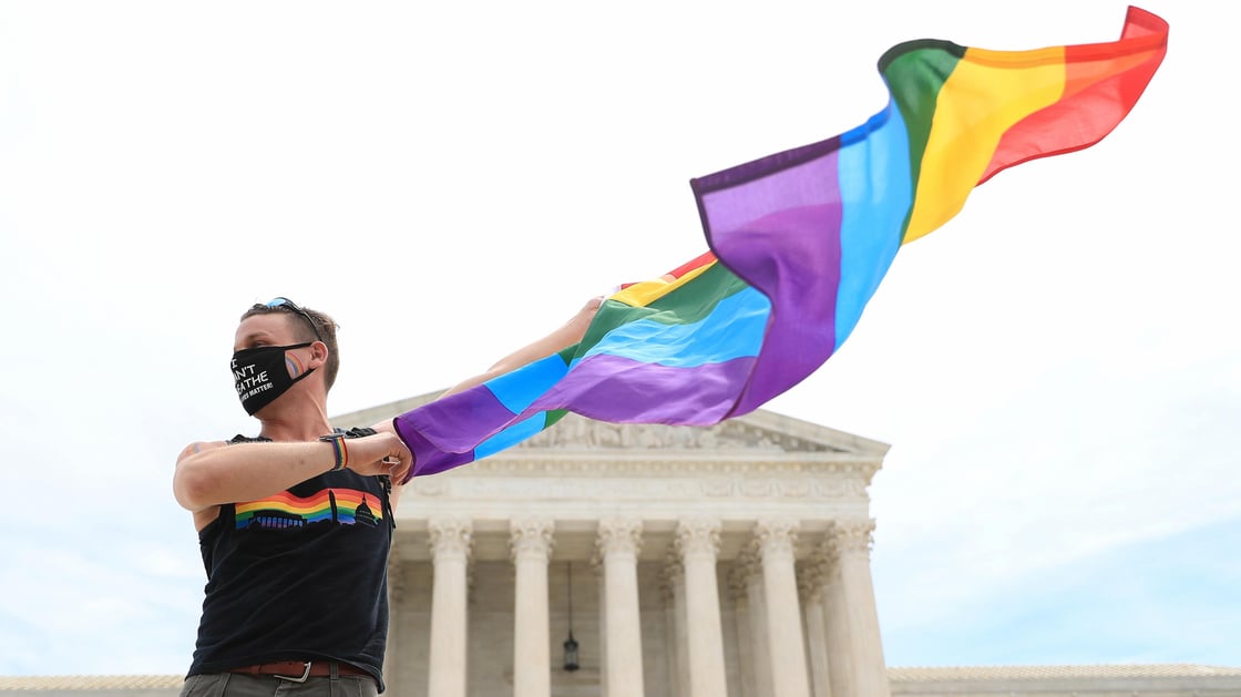 Joseph Fons stands in front of the U.S. Supreme Court building after the court ruled that a federal law banning workplace discrimination also covers sexual orientation