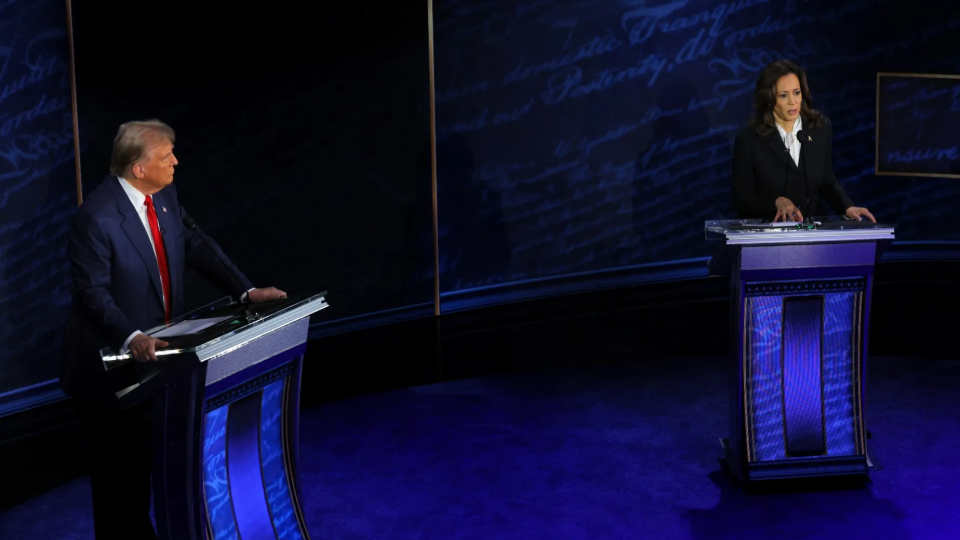 Kamala Harris speaks during a presidential debate hosted by ABC in Philadelphia as Donald Trump listens