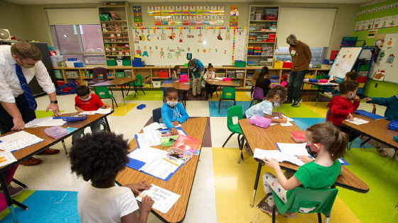 Kindergarden students work in classrooms at Ross Elementary School in Topeka Wednesday morning