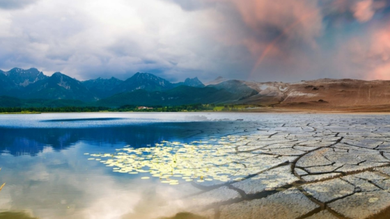 Landscape with mountains, a lake, and a dried desert