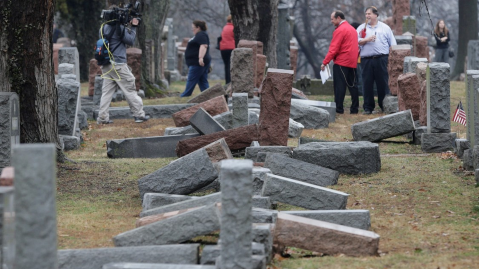 Local and national media report on more than 170 toppled Jewish headstones at Chesed Shel Emeth Cemetery