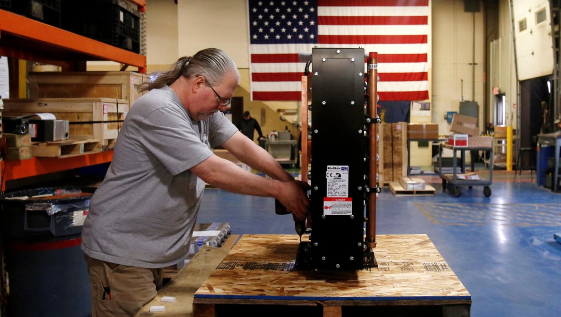 Mike Pawloski prepares to ship a newly assembled transformer to a client in the RoMan Manufacturing plant in Grand Rapids, Michigan, U.S. December 12, 2018. Picture taken