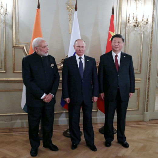 Narendra Modi, Vladimir Putin, and Xi Jinping pose for photos on the outskirts of the G20 summit