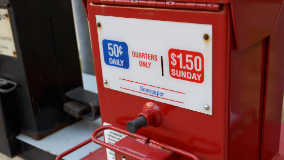 Newspaper box with prices labelled