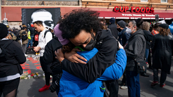 Nic Hernandez and Emma Ruddock hug in celebration after hearing the verdict of Derek Chauvin