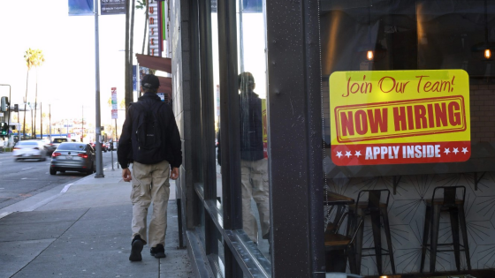 Now hiring sign shown on window of establishment