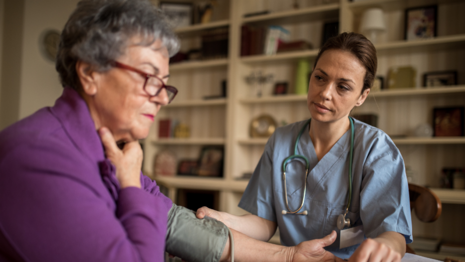 Nurse attending to patient