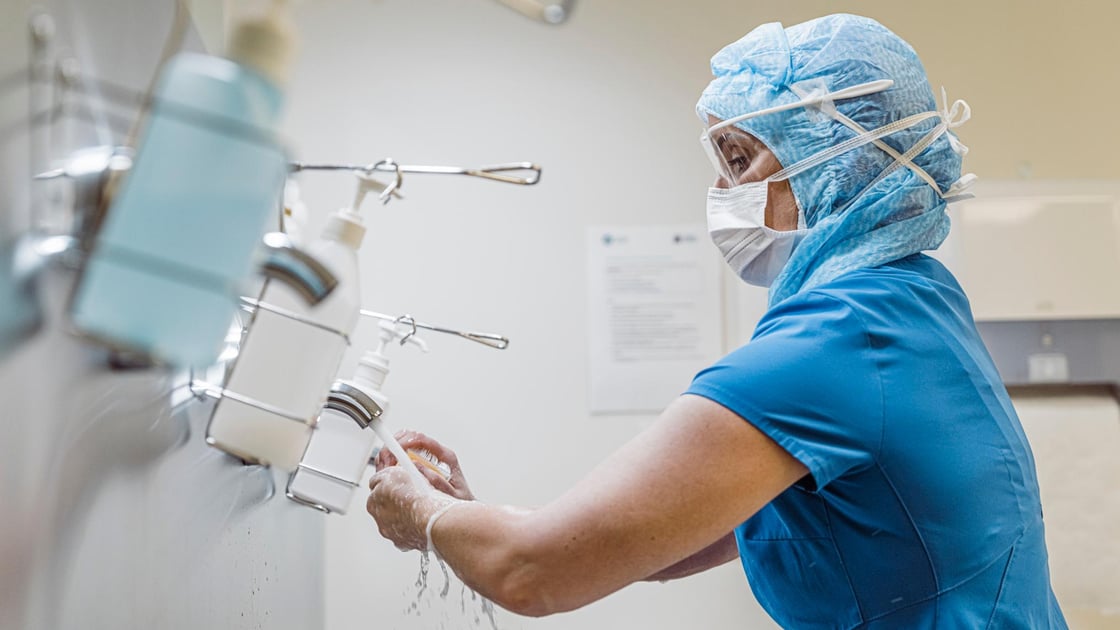 Nurse doing hand hygiene to prevent Coronavirus infection