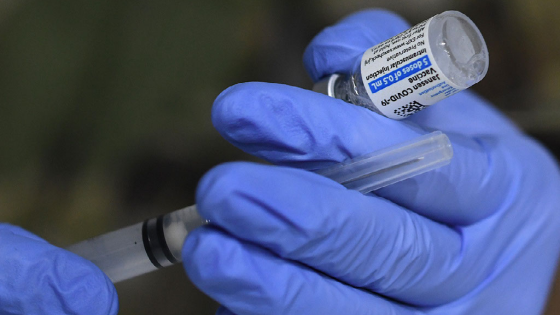 Nurse fills a syringe with the Johnson and Johnson vaccine at the FEMA-supported COVID-19 vaccination site