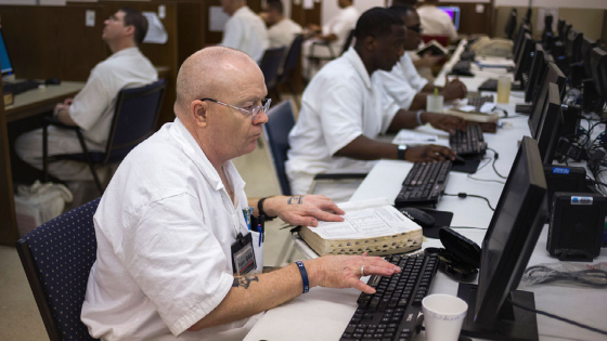 Offenders research and work on their papers inside the Southwestern Baptist Theological computer lab