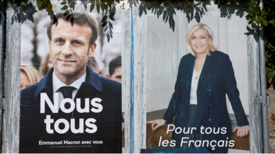 Official campaign posters of 2022 French presidential election candidates are displayed in Herbeville