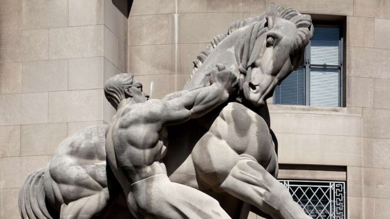 One is Man Controlling Trade statue at Federal Trade Commission building