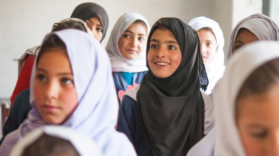 Pakistani children learning in a classroom.