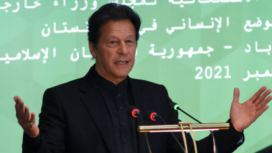 Pakistans Prime Minister Imran Khan speaks during the 17th extraordinary session of the Organisation of Islamic Cooperation (OIC) Council