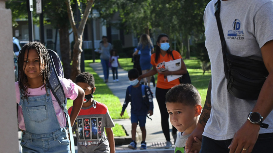 Parents dropping children off at school