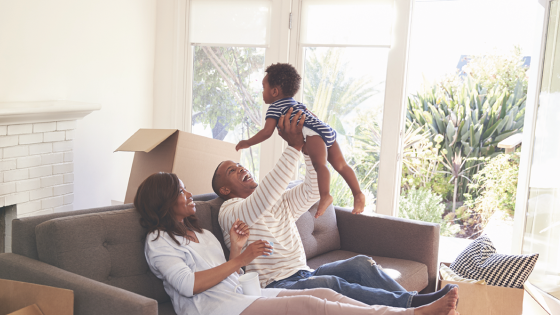 Parents with baby in new house