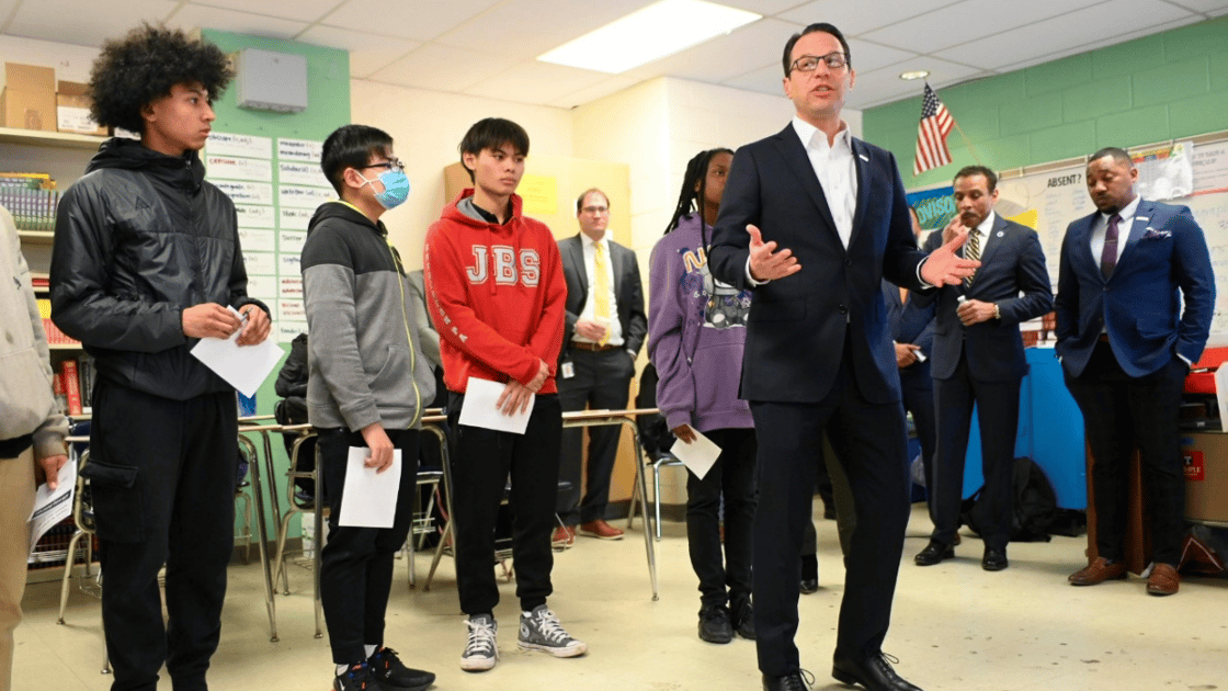 Pennsylvania Governor Josh Shapiro speaks to students in a classroom during a visit to G.W. Carver High School of Engineering and Science