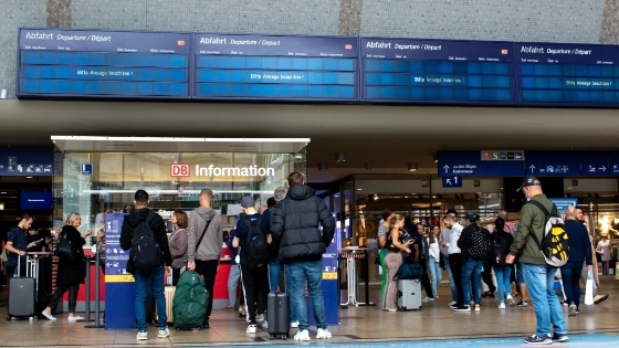 People gather at the Cologne Central Railway station in Germany