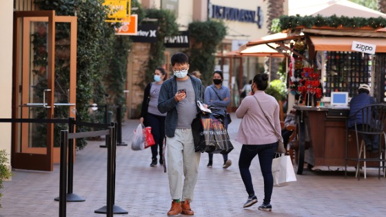 People shop at the Citadel Outlet mall