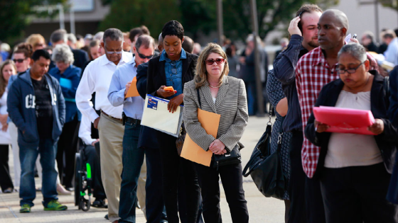 People standing in line to meet with job recruiters