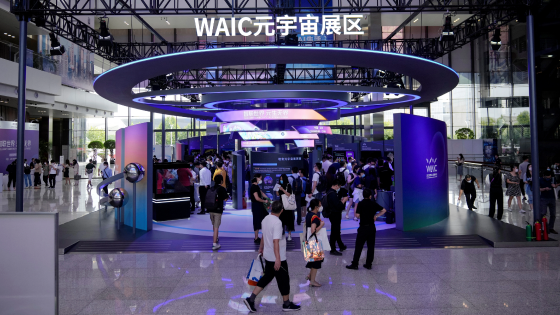 People visit a metaverse booth during the World Artificial Intelligence Conference in Shanghai