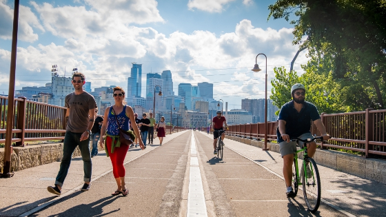 People walking and biking on city trail