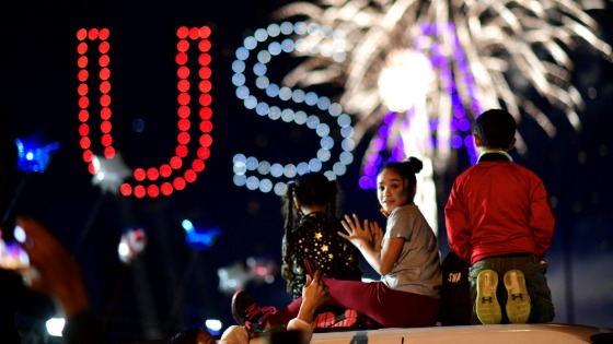 People watch fireworks after media announced that Democratic U.S. presidential nominee Joe Biden has won