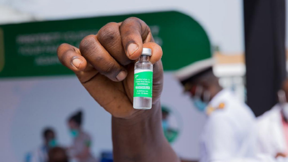 Person holds covishield vial