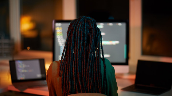 Person looking at various screens