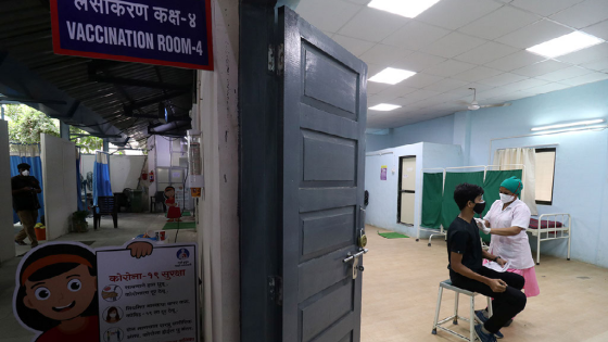 Person receives their first dose of a COVID-19 vaccine in Mumbai