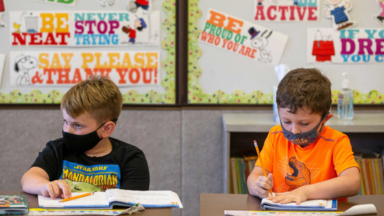 Pre-school students working classroom